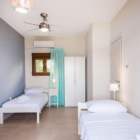 Nereus & Oceanus Beachfront Apartments, Lagonisi Beach #Feelslikehome Ormos Panagias Eksteriør billede