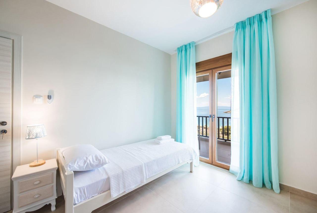 Nereus & Oceanus Beachfront Apartments, Lagonisi Beach #Feelslikehome Ormos Panagias Eksteriør billede