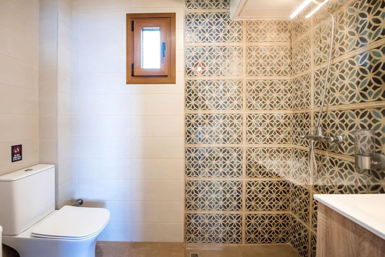 Nereus & Oceanus Beachfront Apartments, Lagonisi Beach #Feelslikehome Ormos Panagias Eksteriør billede